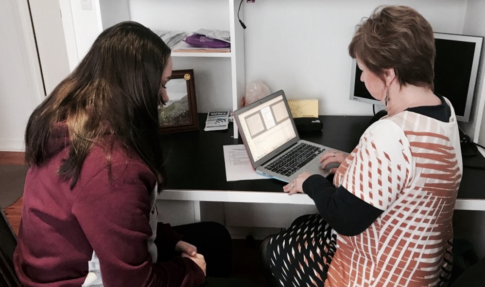 Denise helping a client prepare for the NDIS 